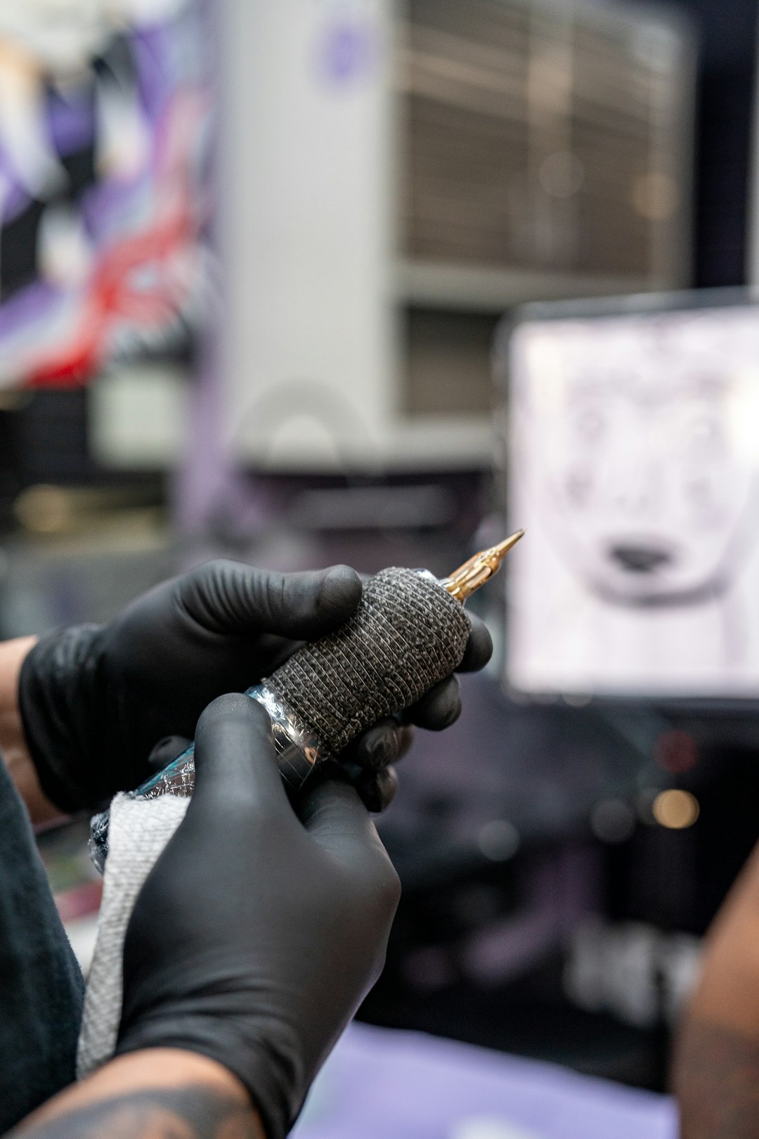 Setting up a sterile tattoo workstation during a tattoo course in Raipur