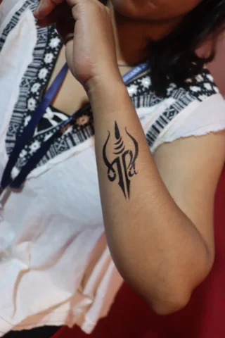Shiva Trishul Forearm Tattoo | Art and Artist Tattoo Shop Shiva trishul tattoo on forearm done at Art and Artist Tattoo Shop, bold black ink design