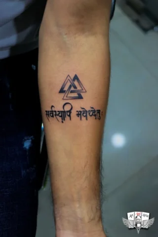 Sanskrit Symbol Tattoo in Tattoo Raipur | Art and Artist Tattoo Studio Sanskrit symbol tattoo on forearm done at tattoo raipur studio with clean black ink