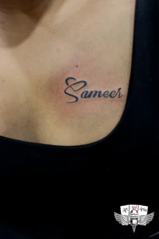 Sameer Name Collarbone Tattoo by Tattoo Artist in Raipur | Art and Artist Tattoo Studio Sameer name tattoo on collarbone done by tattoo artist in raipur with fine black ink