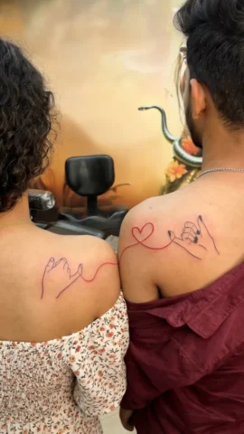 couple tattoo at tattoo studio in raipur